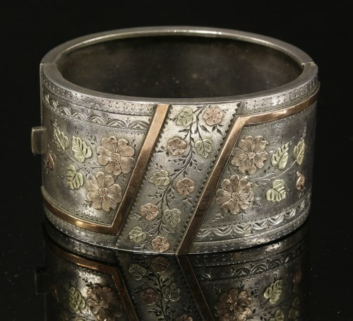 Lot 78 - A Victorian sterling silver Aesthetic period hinged bangle