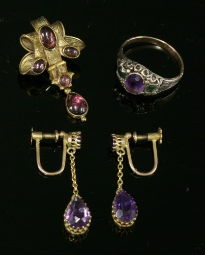Lot 57 - A pair of gold and amethyst drop earrings