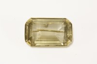 Lot 4 - A gold emerald cut smokey quartz brooch/pendant