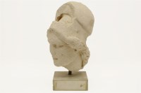 Lot 229 - A carved head