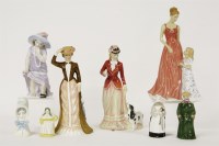 Lot 185 - A quantity of ceramic figures and snuffers