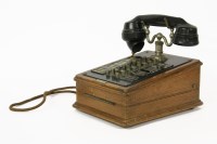 Lot 190 - A 1920's oak cased telephone