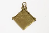 Lot 24 - An 18ct gold off set square shaped locket