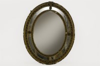 Lot 449 - A George III gilt framed oval mirror