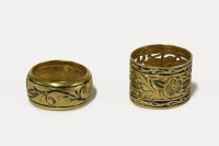 Lot 1 - Two gold enamel band rings