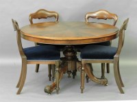 Lot 517 - A Victorian walnut breakfast table