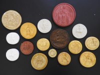 Lot 210 - A large collection of plaster medallions predominantly facsimile seals