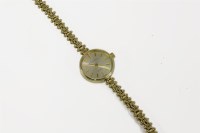 Lot 20 - A ladies 9ct gold Garrard quartz bracelet watch