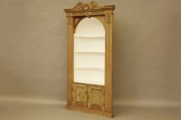 Lot 458 - A George III pine and painted corner cupboard