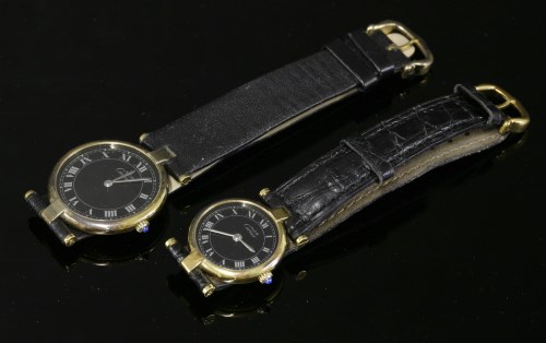 Lot 66 - A set of a gentleman's and a lady's matching Vermeil Must de Cartier quartz strap watches