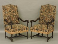 Lot 429 - A pair of carved walnut armchairs