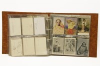 Lot 120 - A postcard album and approximately 100 postcards of Indian (principally) women