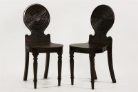 Lot 513 - A pair of 19th century mahogany hall chairs