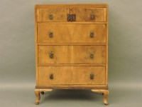 Lot 496 - Art Deco walnut four drawer chest