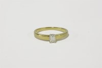 Lot 4 - An 18ct gold single stone emerald cut diamond ring