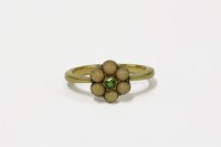 Lot 18 - A gold demantoid garnet and coral cabochon daisy cluster ring
4.51g