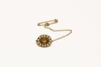 Lot 65 - A Victorian gold citrine and split pearl brooch