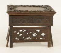Lot 459 - A Balinese carved oak box