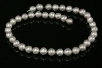 Lot 273 - A single row uniform semi-baroque cultured pearl necklace