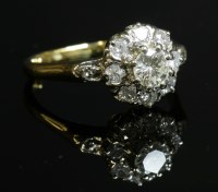 Lot 72 - A diamond set cluster ring