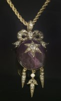 Lot 26 - A Victorian amethyst and diamond pendant