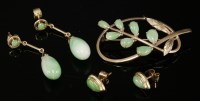 Lot 124 - A pair of gold and jade drop earrings