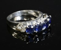 Lot 216 - A four stone sapphire ring