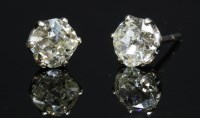 Lot 90 - A pair of single stone diamond stud earrings