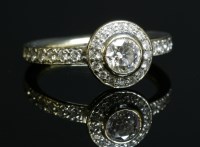 Lot 353 - A circular diamond cluster ring
