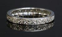 Lot 165 - A diamond set full eternity ring