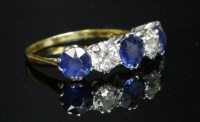 Lot 339 - A five stone graduated sapphire and diamond ring