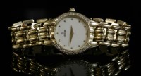 Lot 324 - A ladies' 18ct gold diamond set Concord quartz bracelet watch