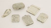 Lot 558 - A collection of six silver and white metal vestas