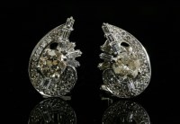 Lot 169 - A pair of diamond set spray earrings
