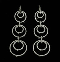 Lot 377 - A pair of 18ct white gold diamond drop earrings