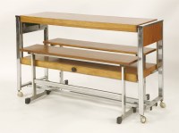Lot 454 - A teak and chrome cantilever table