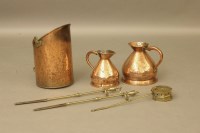 Lot 358 - Two copper haystack measures