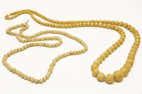 Lot 44 - An early 20th century single row graduated ivory bead necklace