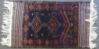 Lot 561 - A 20th century Pakistan wool rug