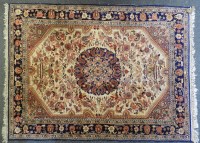 Lot 562 - A Persian style carpet