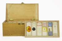 Lot 194 - A wooden box of Victorian and later microscope slides