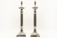 Lot 429 - A pair of silver plated classical column table lamps