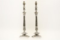Lot 279 - A pair of Empire style silver plated table lamps