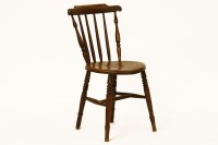 Lot 550 - An early 19th century country spindle back chair