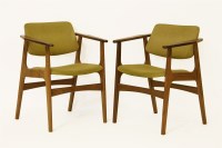 Lot 515 - A pair of teak armchairs
