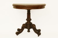 Lot 485 - A Victorian fold over card table