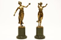 Lot 365 - Pair of French bronze figures on marble bases
