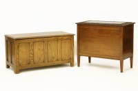 Lot 563 - An oak coffer with panelled side