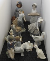 Lot 351 - Nine Spanish pottery figures