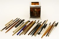 Lot 205 - A faux tortoiseshell and silver plated pen pot
